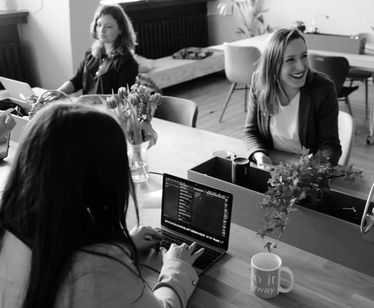 women working on computer